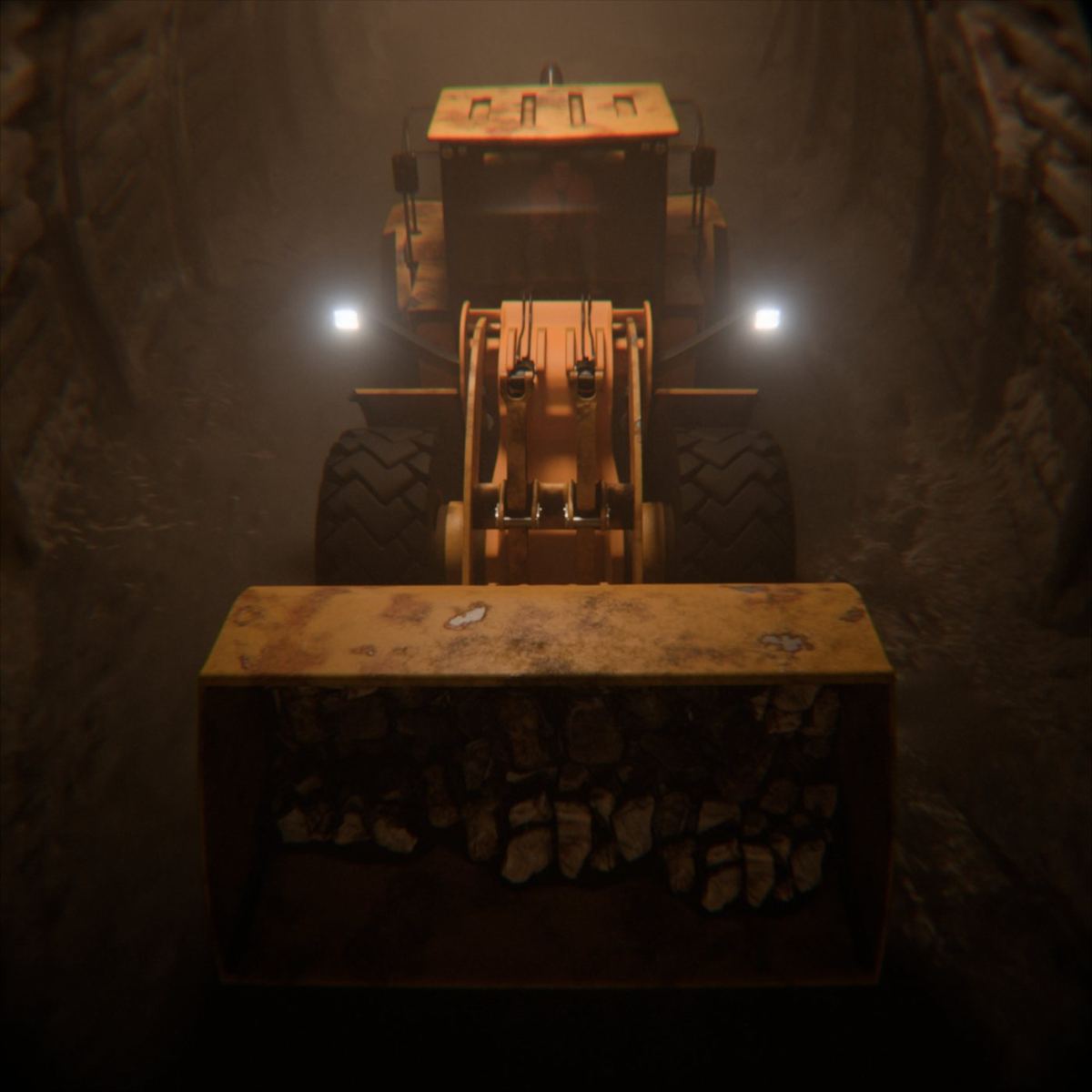 Underground loader carrying ore through a dusty drive